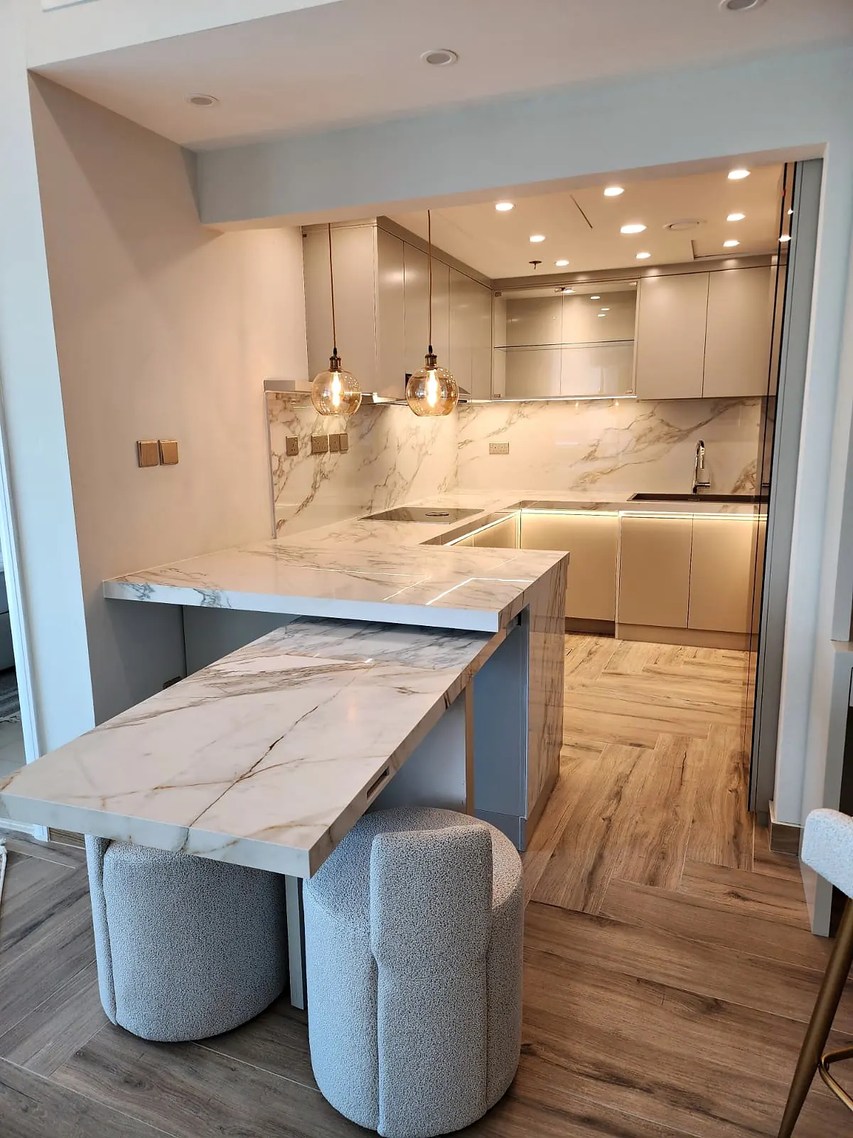 Stone kitchen island and fitted joinery