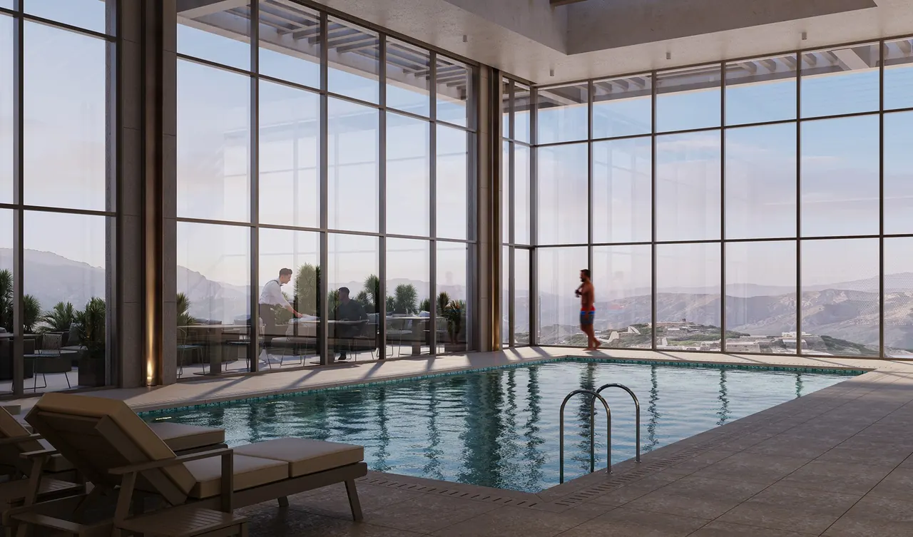Indoor pool design with full-height glazing
